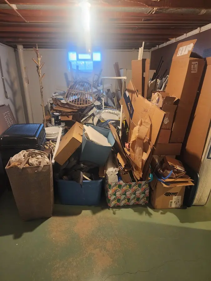 Roll-off dumpster container at job site for Concrete Dumpster Rental in Southold